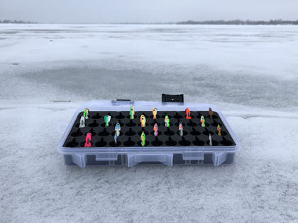 Angled view of FishMore T3 Pro Tackle Box fitting Ice Fishing Jigging Spoons size 1/16 oz to 1/8 oz lures in Plano 3600 size