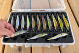 Hand removing lure tangle-free from FishMore T3 Pro Tackle Box fitting Megabass Vision ONETEN lures in Plano 3700 size